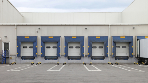 Loading,ramp,cargo,doors,at,distribution,center,warehouse